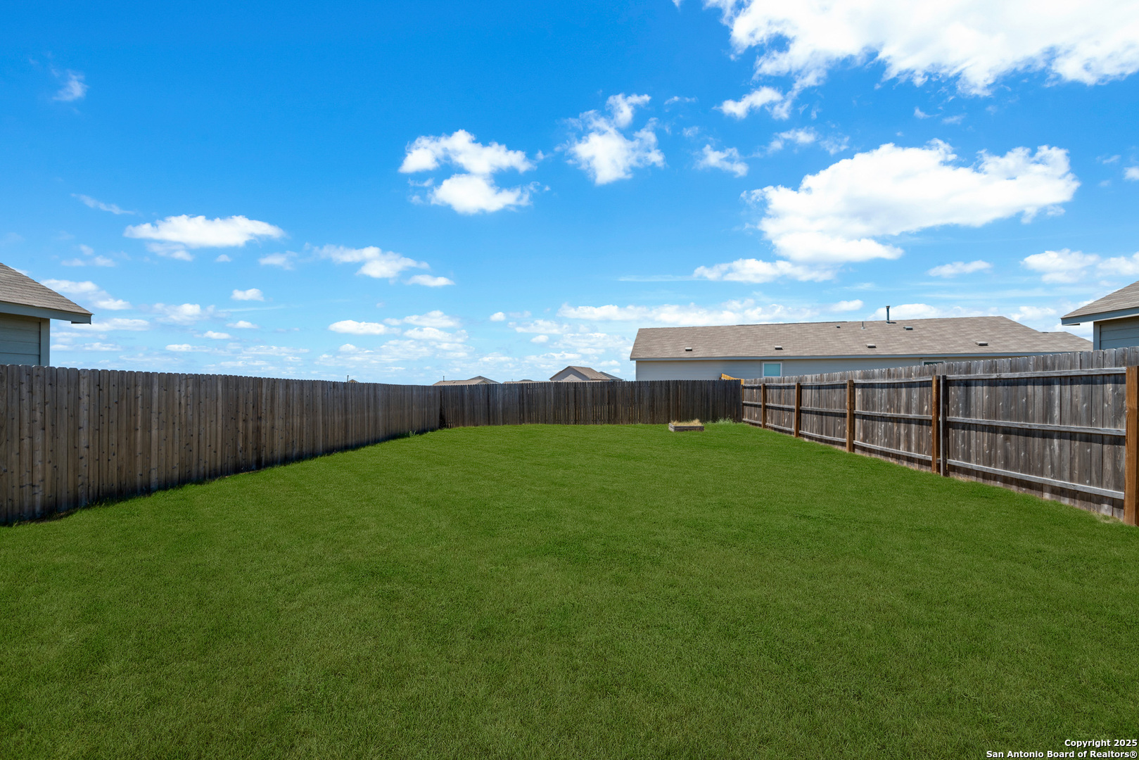 10716 Sweepback Trail Converse, TX 78109 - Photo 23 of 26 a view of a backyard with a garden