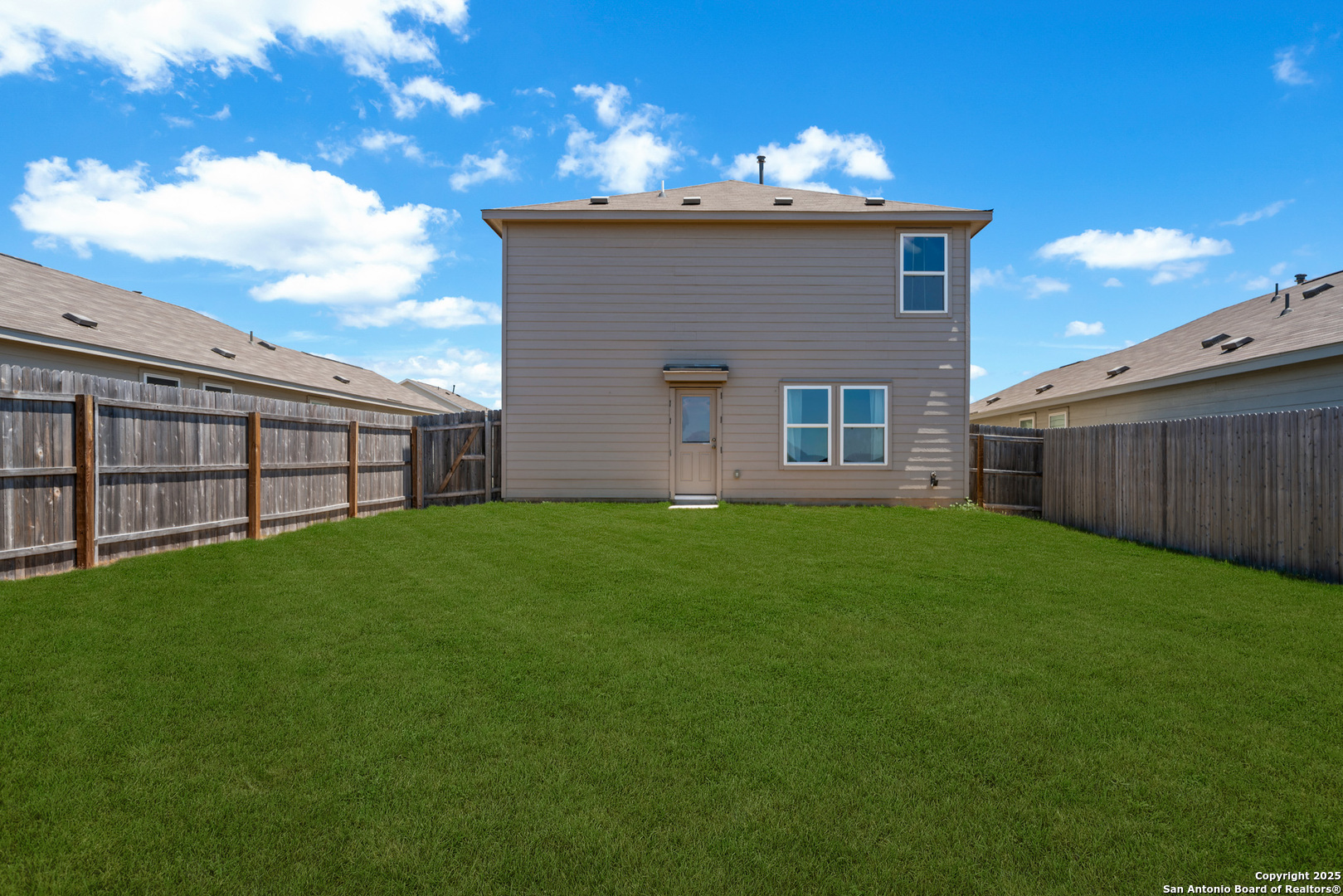 10716 Sweepback Trail Converse, TX 78109 - Photo 25 of 26 a front view of a house with garden