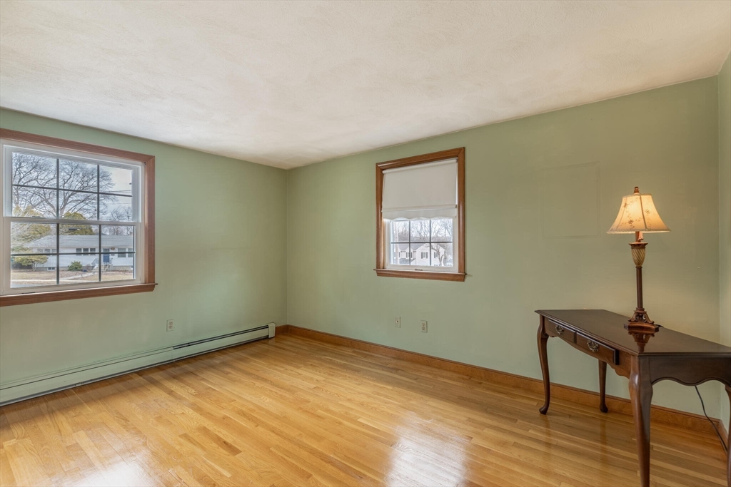 2 Rodgers Road Stoneham, MA 02180 - Photo 19 of 38 a view of a room with wooden floor cabinet and a window