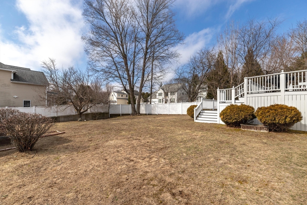 2 Rodgers Road Stoneham, MA 02180 - Photo 28 of 38 a view of a yard with snow on the road