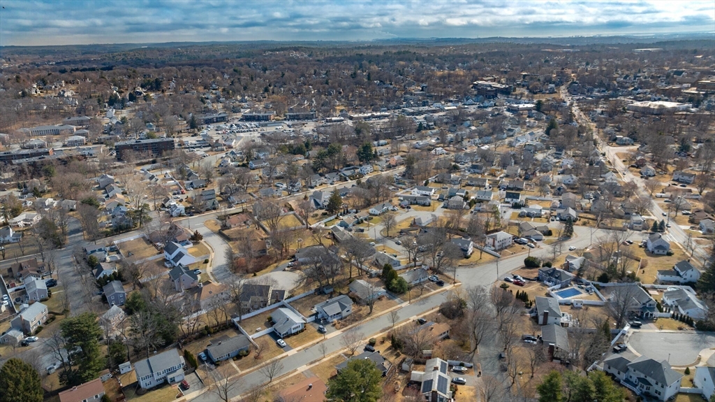 2 Rodgers Road Stoneham, MA 02180 - Photo 32 of 38 an aerial view of a house with a yard