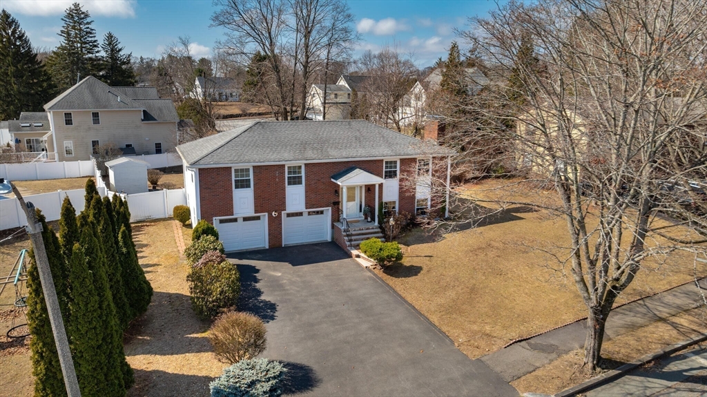 2 Rodgers Road Stoneham, MA 02180 - Photo 33 of 38 a view of a house with a yard