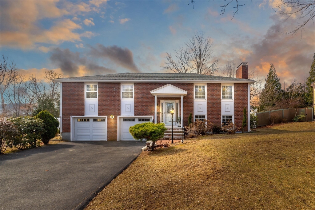 2 Rodgers Road Stoneham, MA 02180 - Photo 34 of 38 a front view of house with yard outdoor seating and barbeque oven