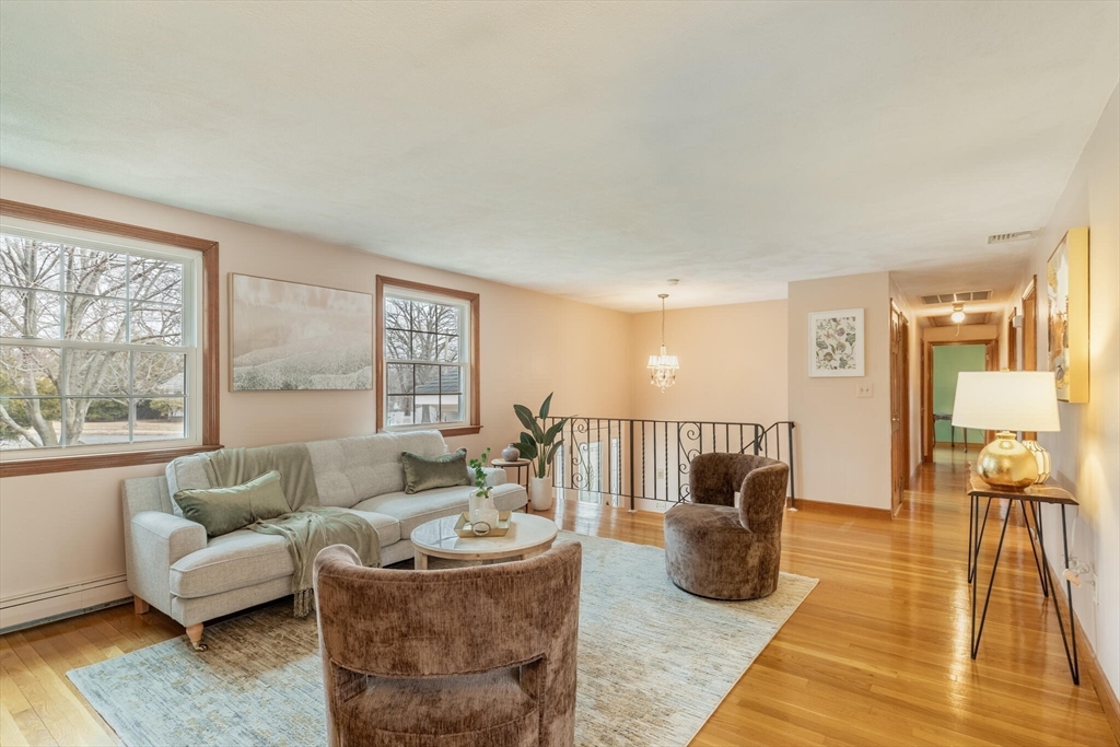 2 Rodgers Road Stoneham, MA 02180 - Photo 8 of 38 a living room with furniture and a table