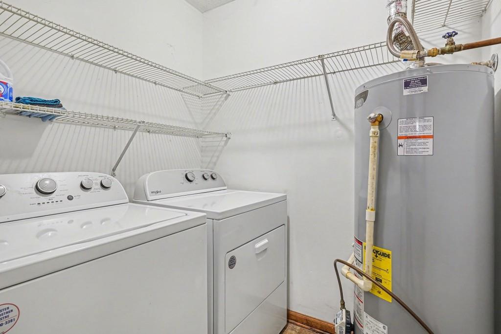 114 Copeland Lane Stockbridge, GA 30281 - Photo 18 of 40 a utility room with dryer and washer