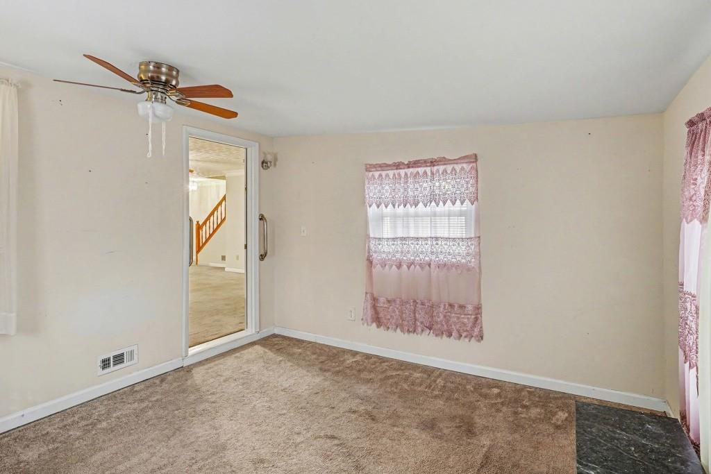 114 Copeland Lane Stockbridge, GA 30281 - Photo 19 of 40 an empty room with windows