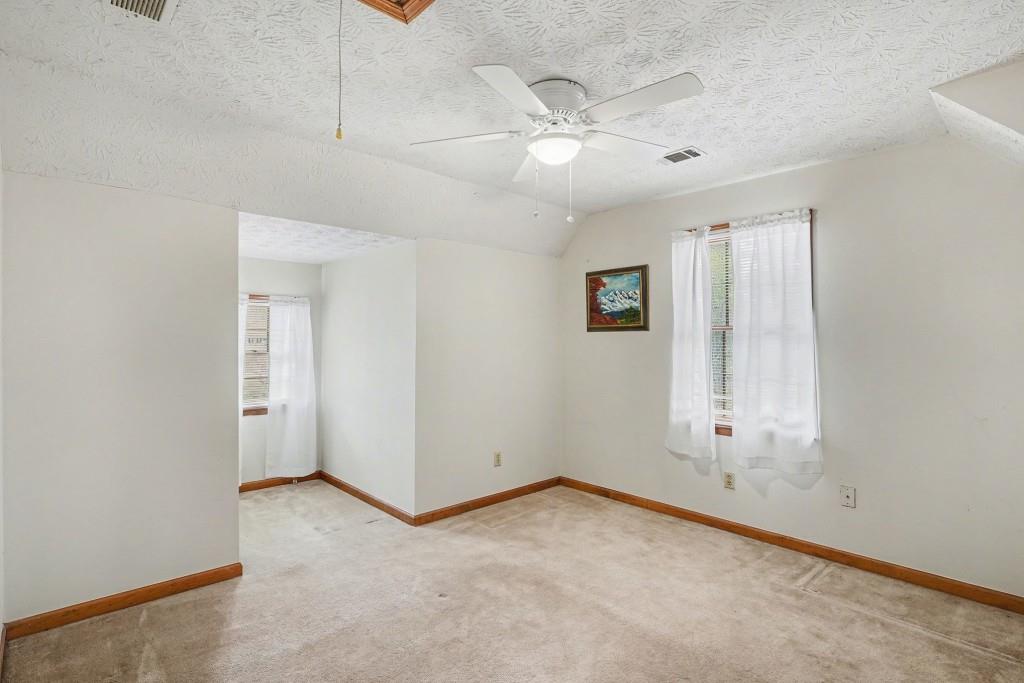 114 Copeland Lane Stockbridge, GA 30281 - Photo 26 of 40 an empty room with windows and fan