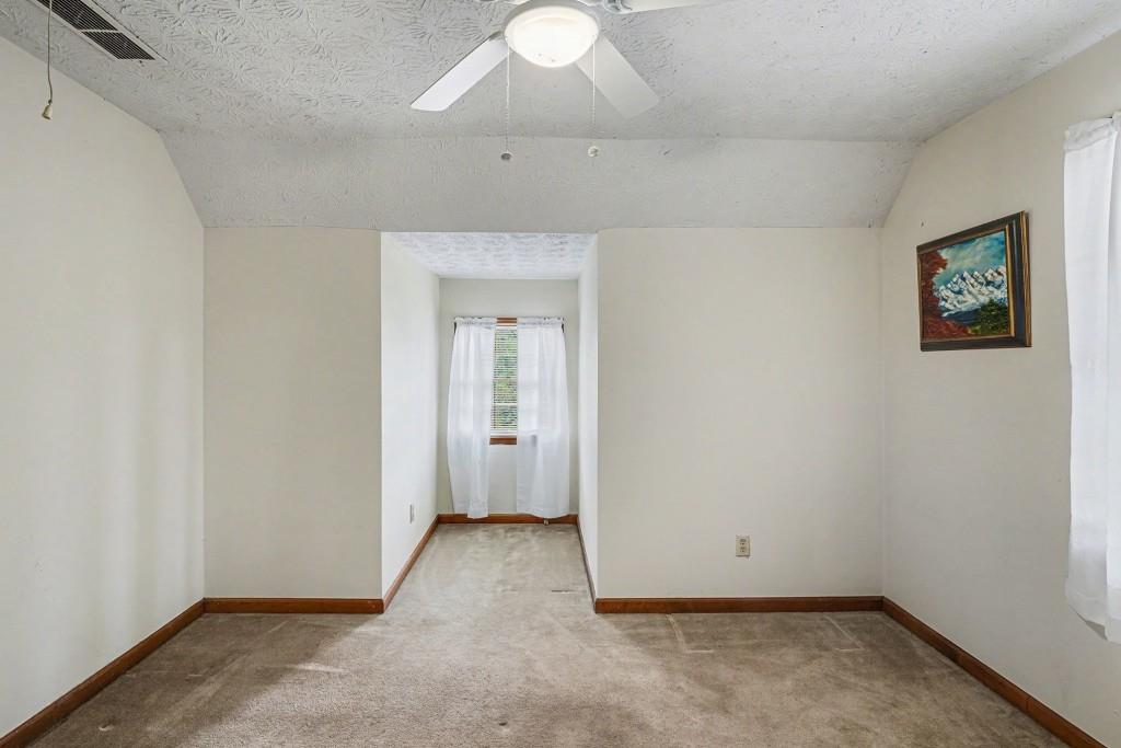 114 Copeland Lane Stockbridge, GA 30281 - Photo 27 of 40 an empty room with a fan & a window