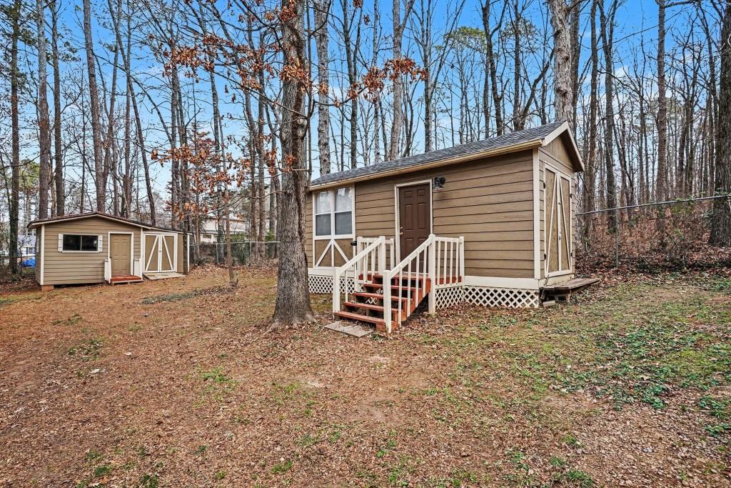 114 Copeland Lane Stockbridge, GA 30281 - Photo 33 of 40 a backyard of a house with table and chairs