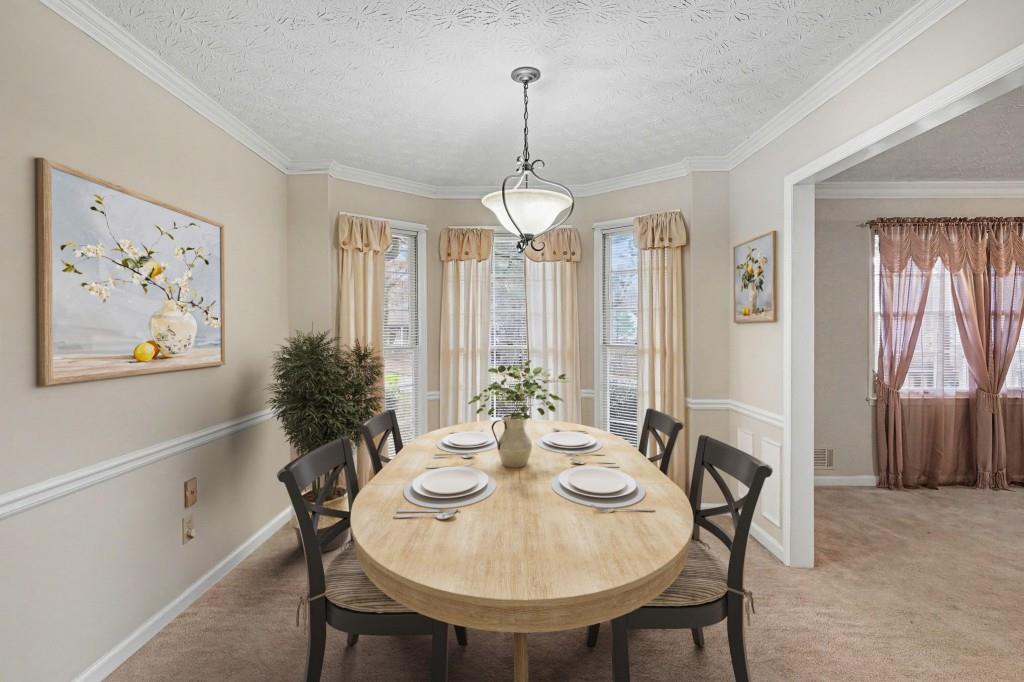 114 Copeland Lane Stockbridge, GA 30281 - Photo 4 of 40 a view of a dining room with furniture window and wooden floor