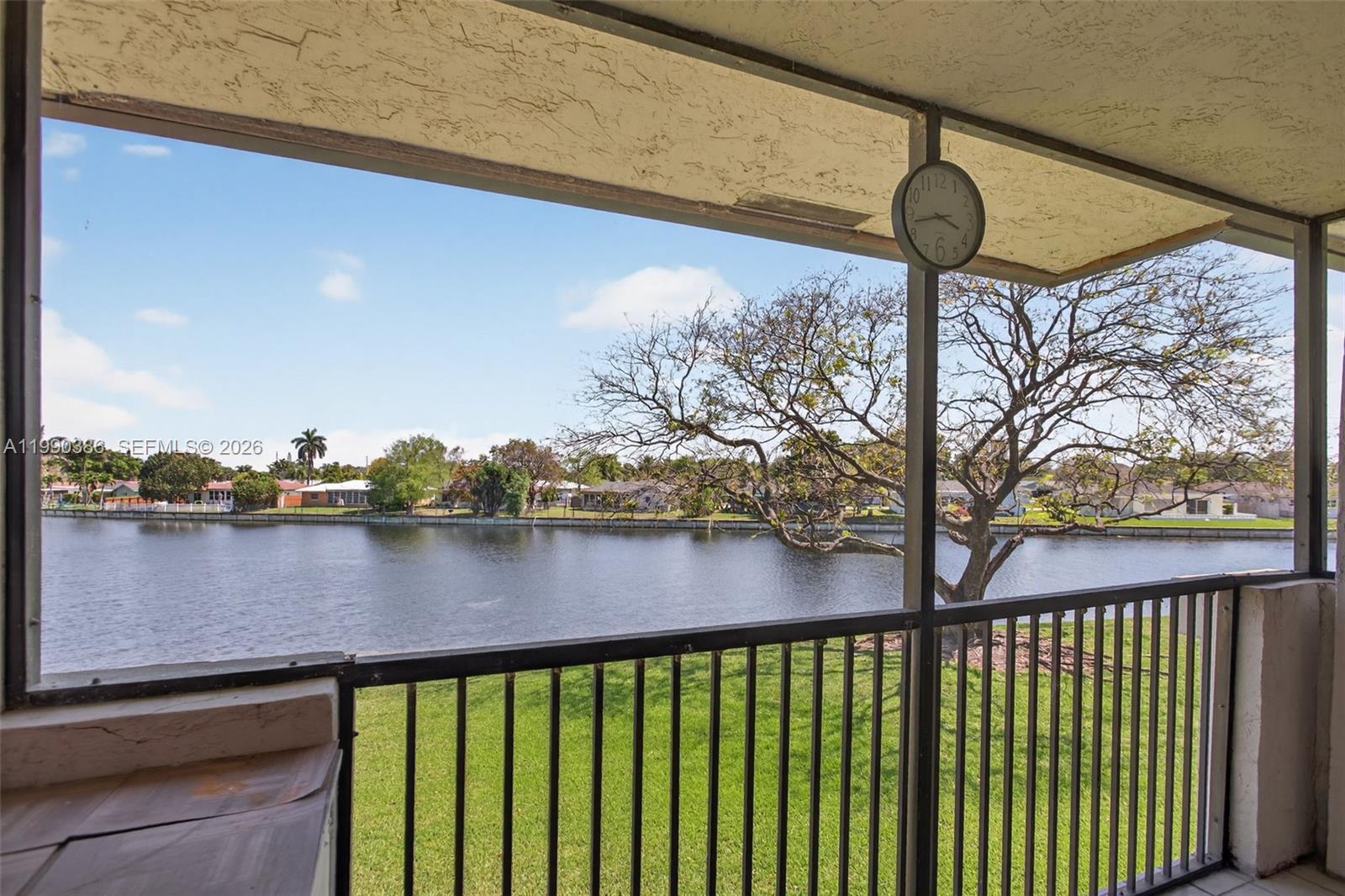 9670 West McNab Road, Unit 208 Tamarac, FL 33321 - Photo 20 of 47 a view of lake from balcony