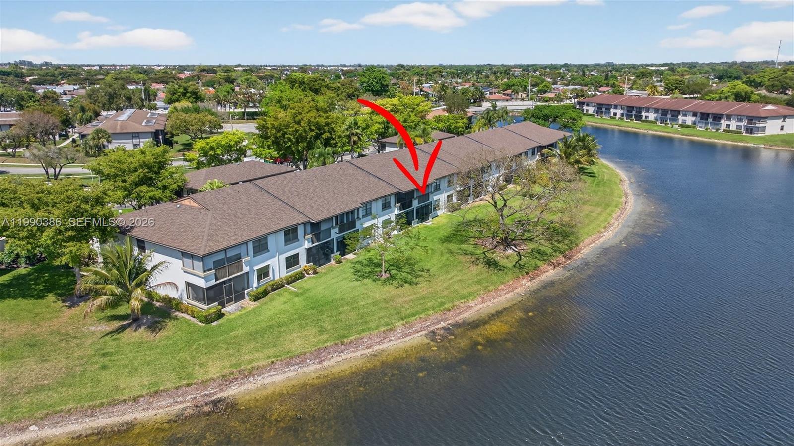 9670 West McNab Road, Unit 208 Tamarac, FL 33321 - Photo 2 of 47 an aerial view of a house with a ocean view