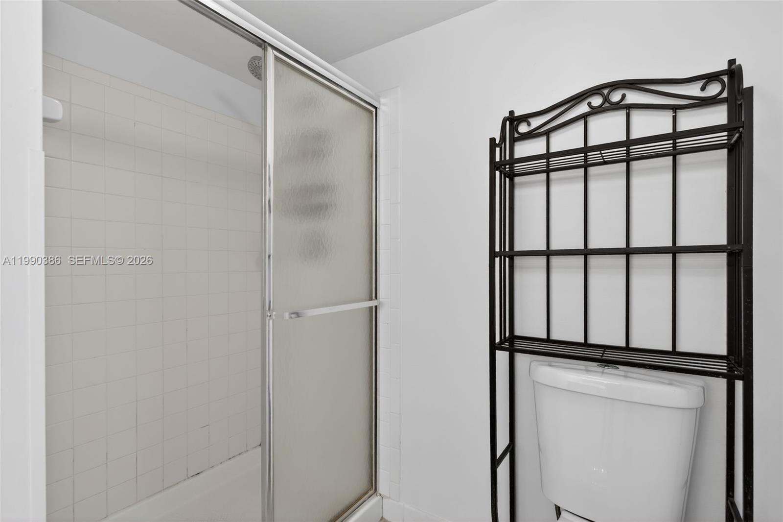 9670 West McNab Road, Unit 208 Tamarac, FL 33321 - Photo 27 of 47 a view of staircase with a window