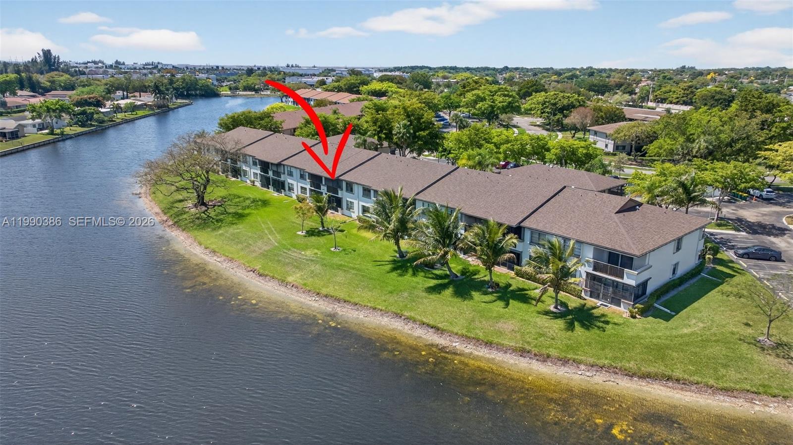 9670 West McNab Road, Unit 208 Tamarac, FL 33321 - Photo 35 of 47 an aerial view of houses with yard