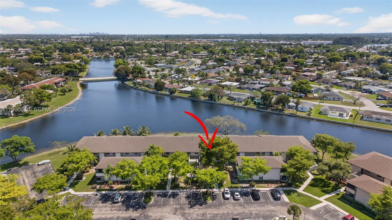 9670 West McNab Road, Unit 208 Tamarac, FL 33321 - Photo 37 of 47 an aerial view of a house with a lake view
