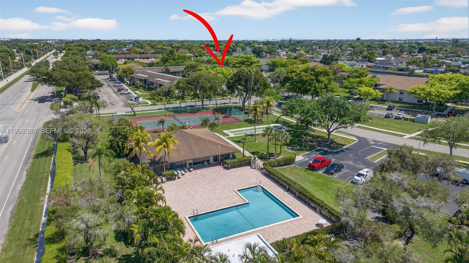 9670 West McNab Road, Unit 208 Tamarac, FL 33321 - Photo 44 of 47 an aerial view of residential houses with outdoor space and street view