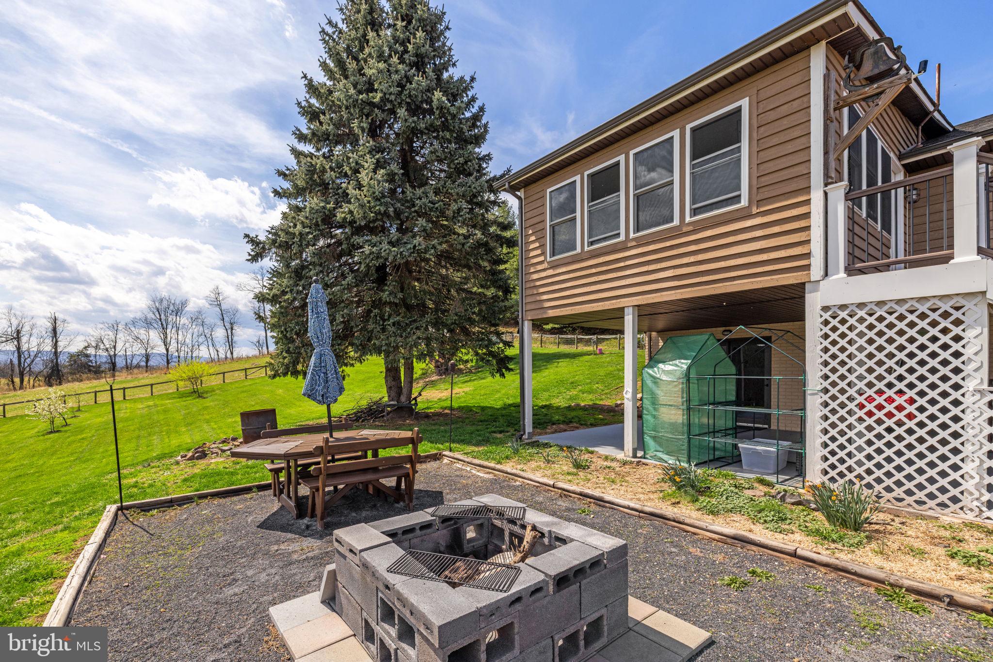740 Whitacre Road Gore, VA 22637 - Photo 73 of 95 Outdoor Rear Picnic and Fire Pit Area