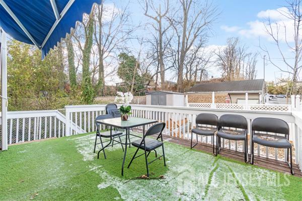 285 Water Street Perth Amboy, NJ 08861 - Photo 12 of 16 a view of a chairs and table in the patio