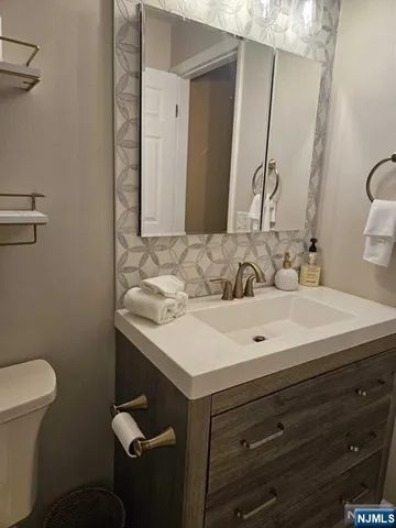 a bathroom with a sink and a toilet
