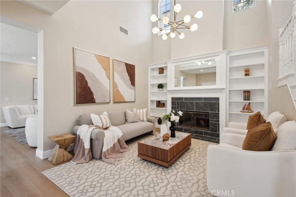 321 Diamond Street, Unit C Arcadia, CA 91006 - Photo 5 of 40 a living room with furniture and a fireplace