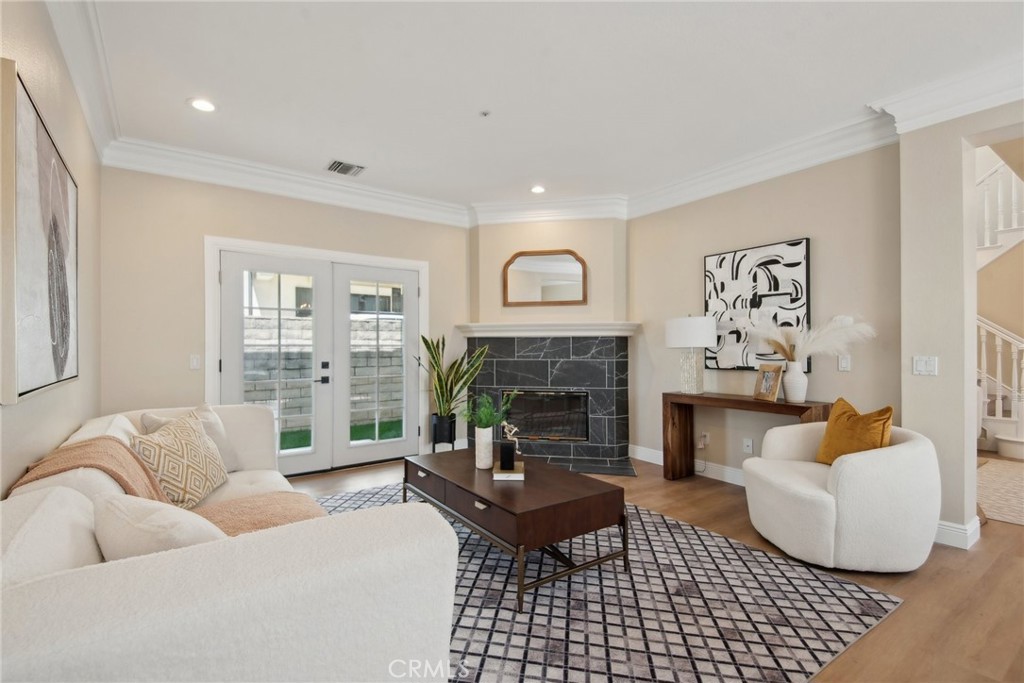 321 Diamond Street, Unit C Arcadia, CA 91006 - Photo 8 of 40 a living room with furniture and a fireplace