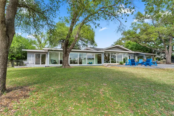 a front view of house with yard and seating