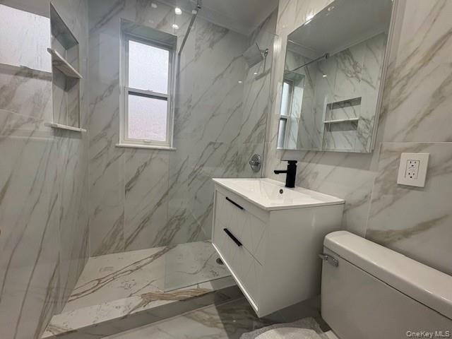 14 South Broadway, Unit 102B Irvington, NY 10533 - Photo 13 of 16 a bathroom with a sink a toilet and shower