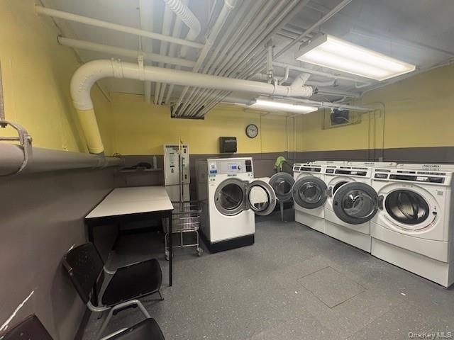 14 South Broadway, Unit 102B Irvington, NY 10533 - Photo 14 of 16 a utility room with dryer and washer