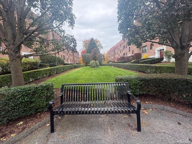 14 South Broadway, Unit 102B Irvington, NY 10533 - Photo 15 of 16 a view of a bench in the garden