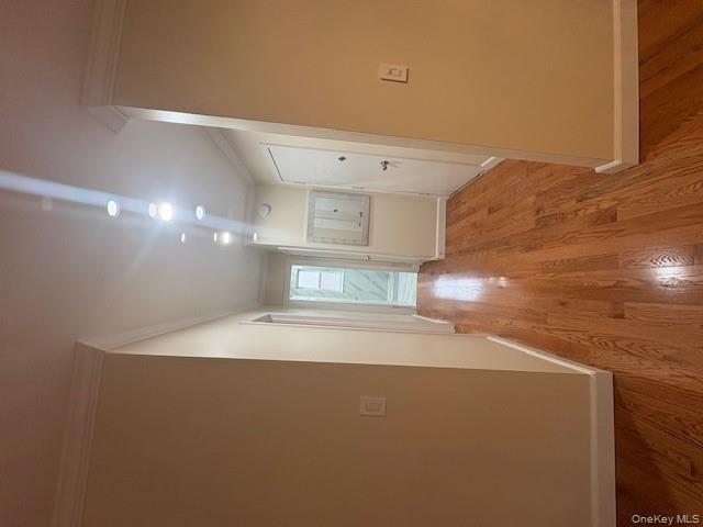 14 South Broadway, Unit 102B Irvington, NY 10533 - Photo 10 of 16 wooden floor in an empty room with a window