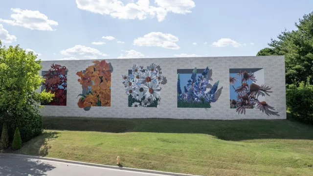 a view of a chairs and table in backyard of the house