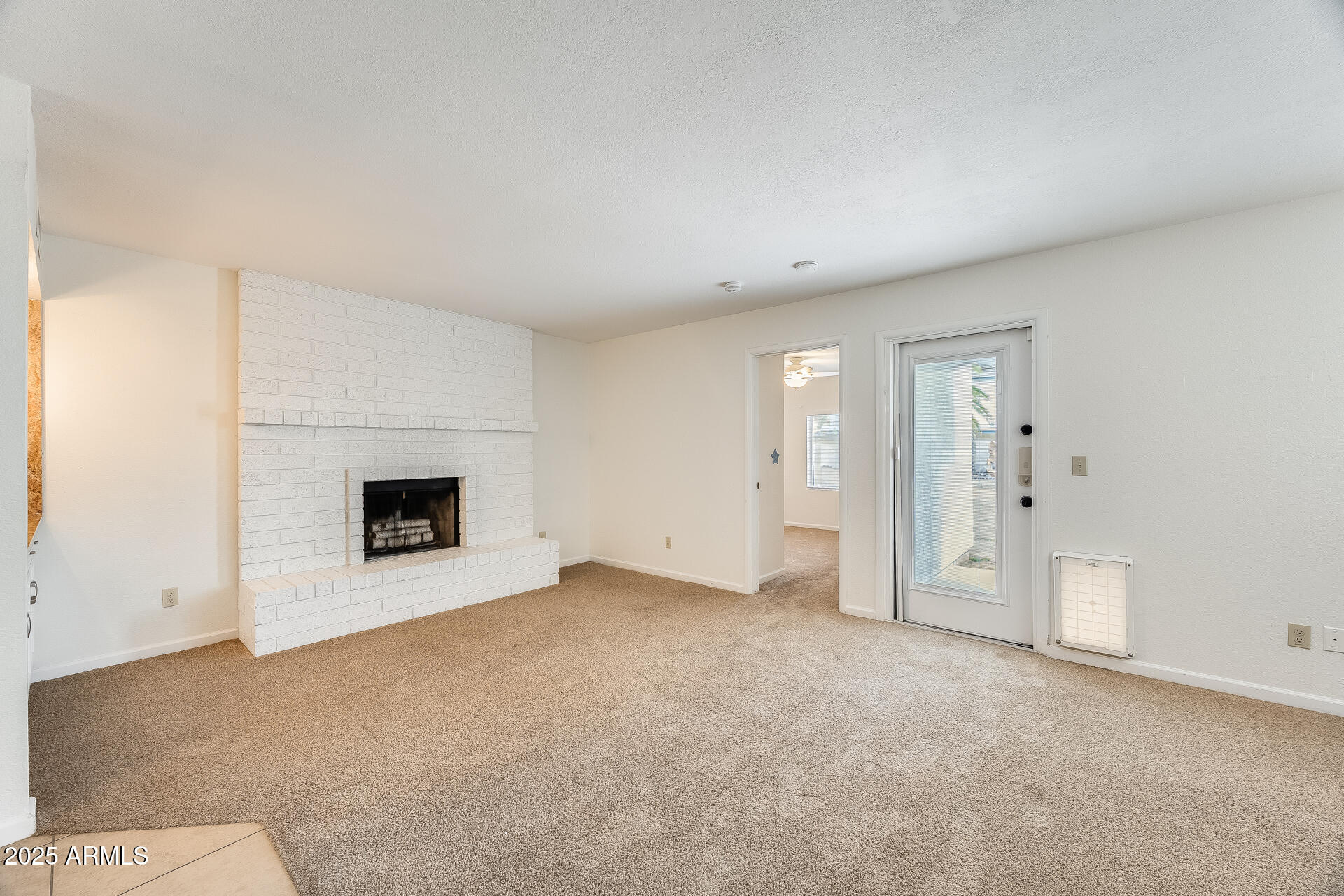 1929 East Redfield Road Phoenix, AZ 85022 - Photo 20 of 58 a view of an empty room with a fireplace
