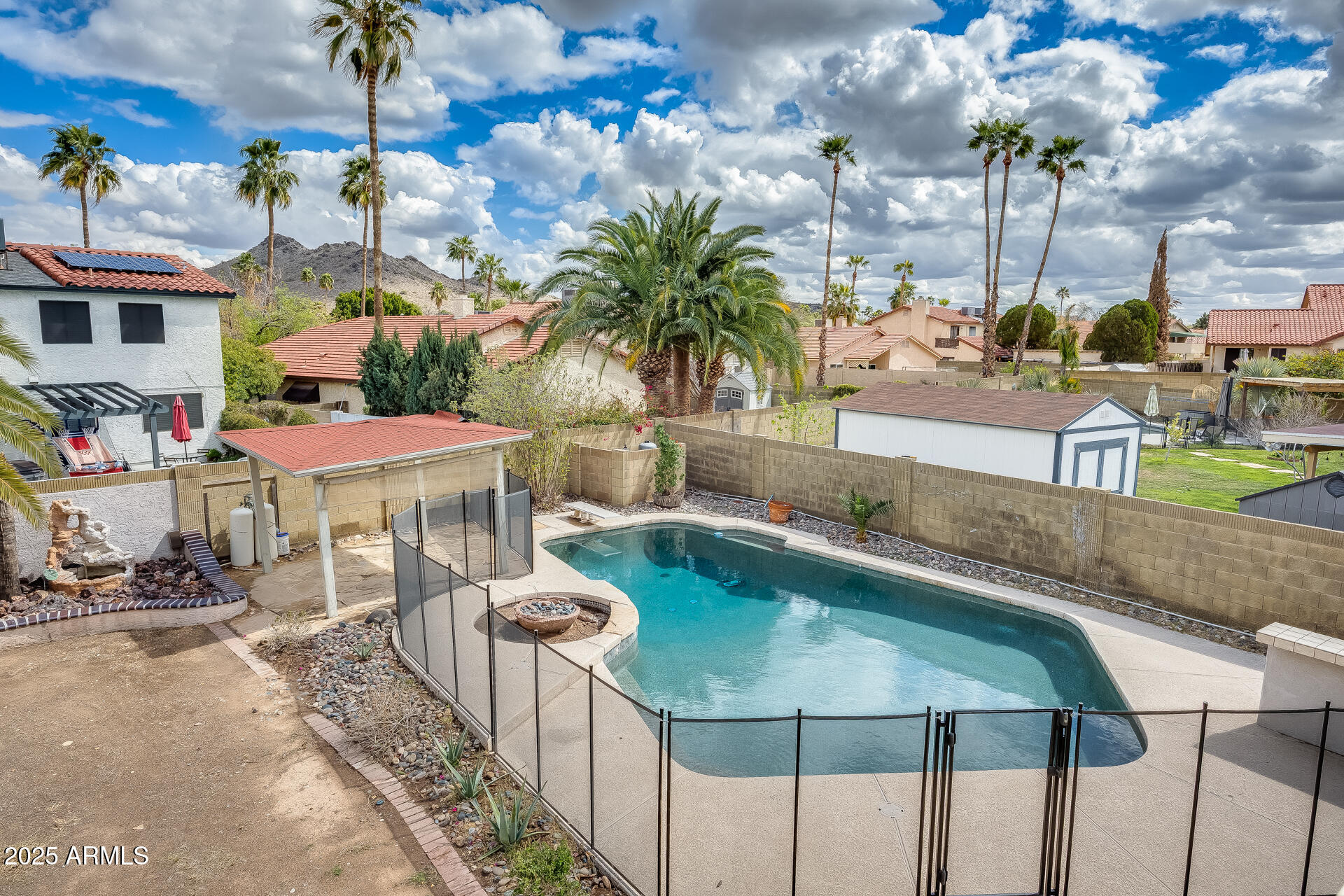1929 East Redfield Road Phoenix, AZ 85022 - Photo 48 of 58 a view of a swimming pool with a patio