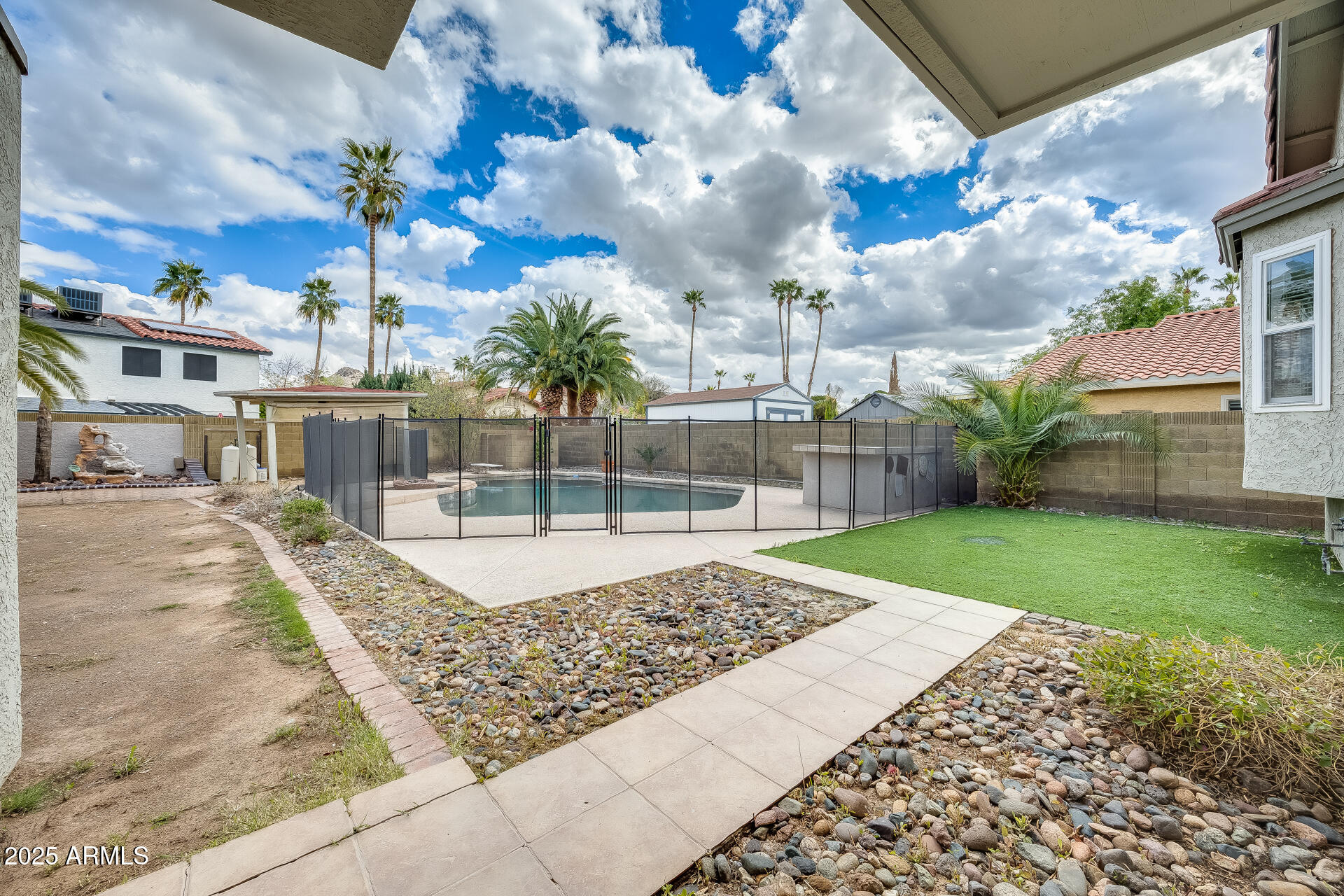 1929 East Redfield Road Phoenix, AZ 85022 - Photo 49 of 58 a view of a backyard of the house