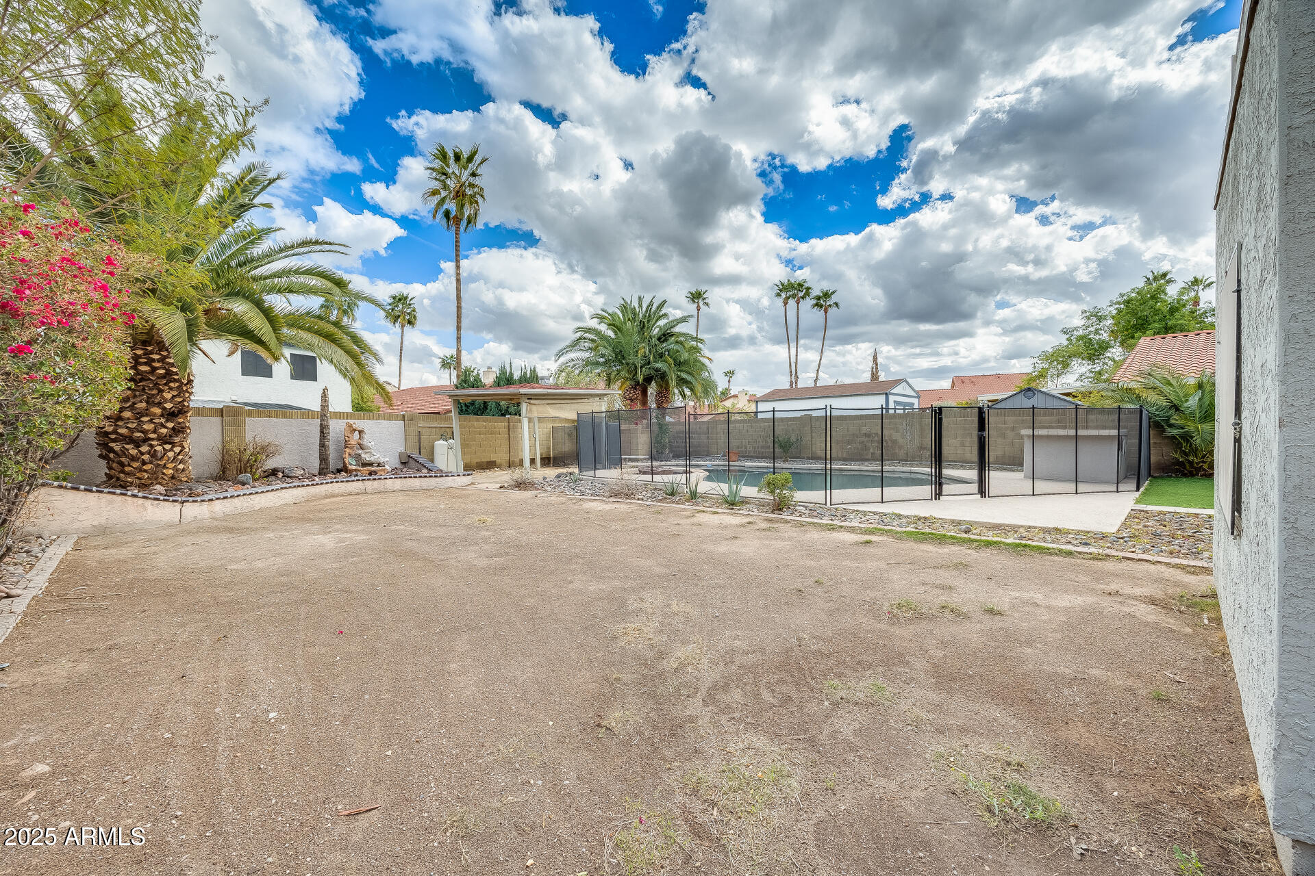 1929 East Redfield Road Phoenix, AZ 85022 - Photo 51 of 58 a house view with a garden space