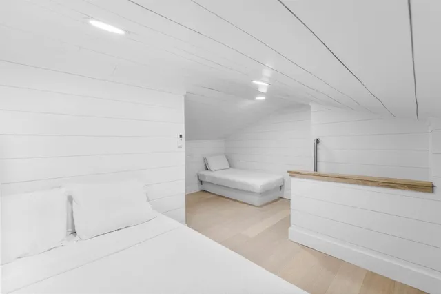 a bathroom with a bathtub and a toilet