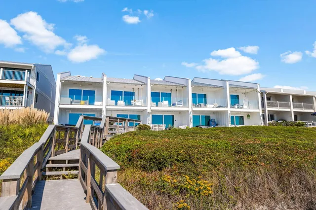 a view of a house with roof deck