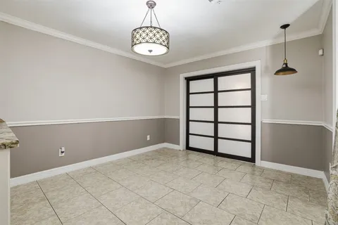 a view of walk in closet and window