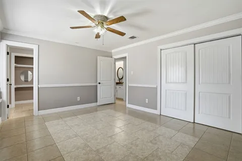 a view of a backyard with sitting area