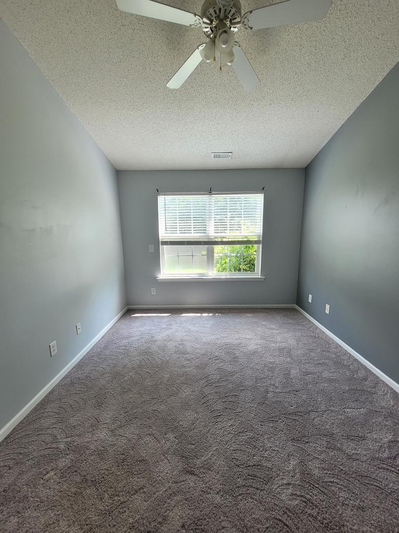 5517 Roan Place Raleigh, NC 27613 - Photo 17 of 35 wooden floor in an empty room with a window