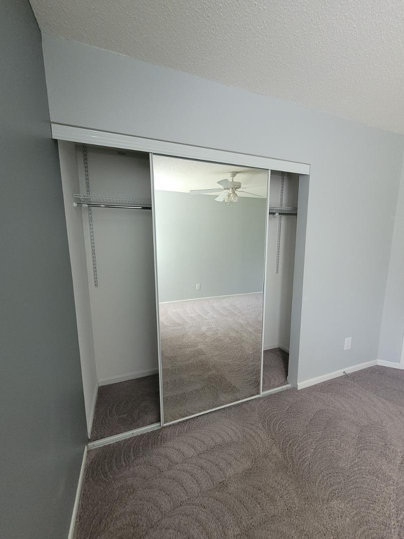 5517 Roan Place Raleigh, NC 27613 - Photo 25 of 35 an empty room with a door