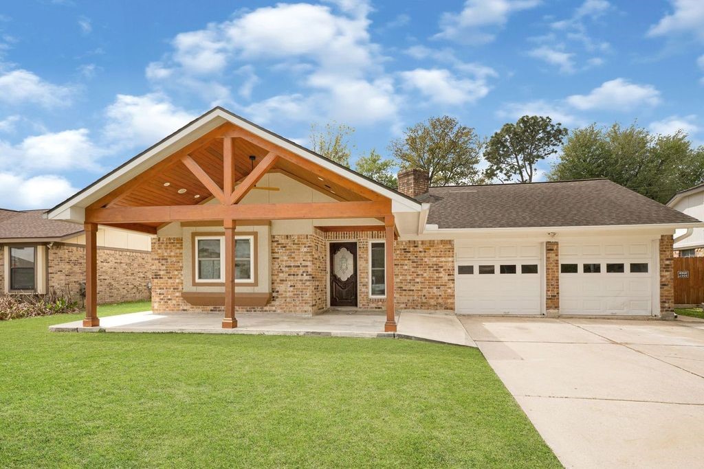 4518 Seneca Street Pasadena, TX 77504 - Photo 1 of 26 front view of a house with a yard
