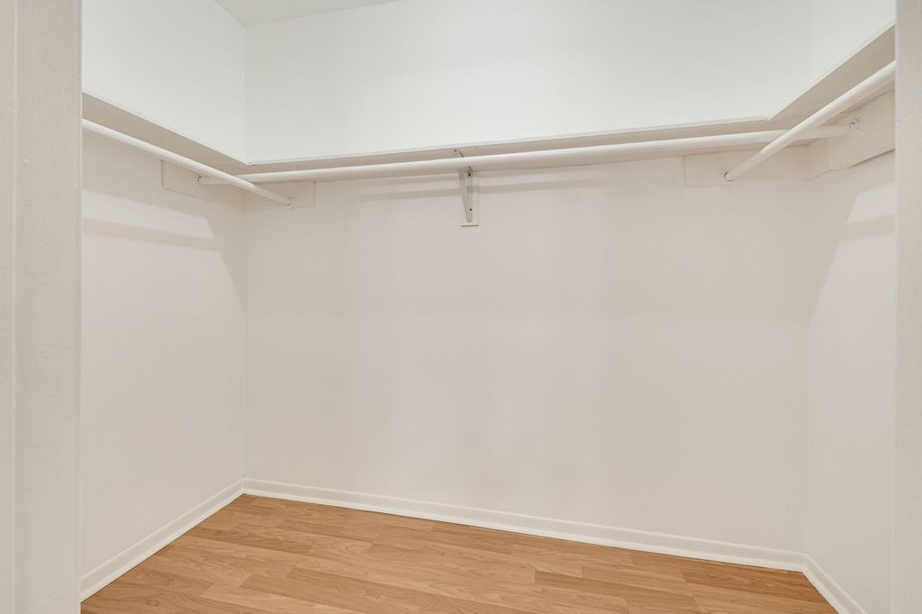 4518 Seneca Street Pasadena, TX 77504 - Photo 19 of 26 a view of a room with wooden floor and fan