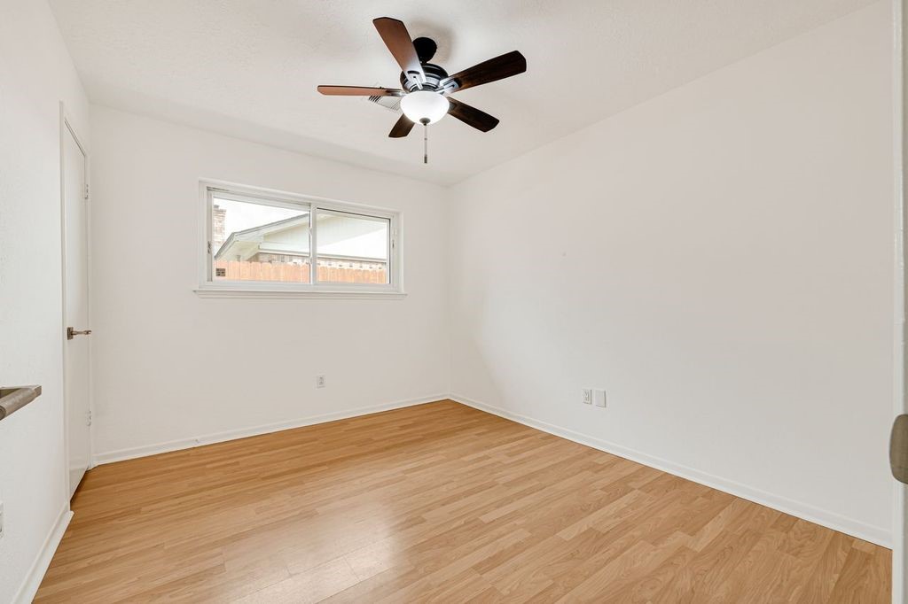 4518 Seneca Street Pasadena, TX 77504 - Photo 20 of 26 a view of empty room with wooden floor