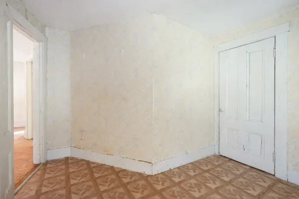 an empty room with a natural light