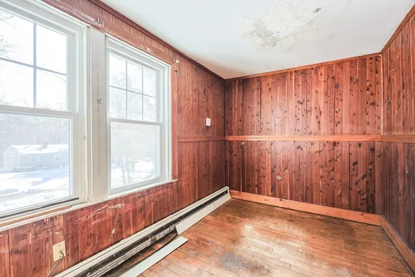 a view of a room with a large window