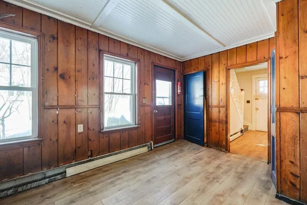 an empty room with windows
