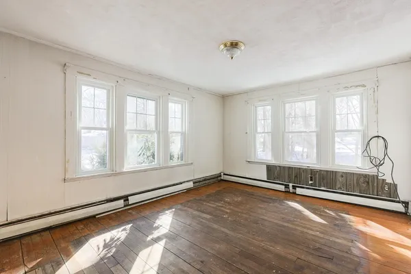 a view of an empty room and window