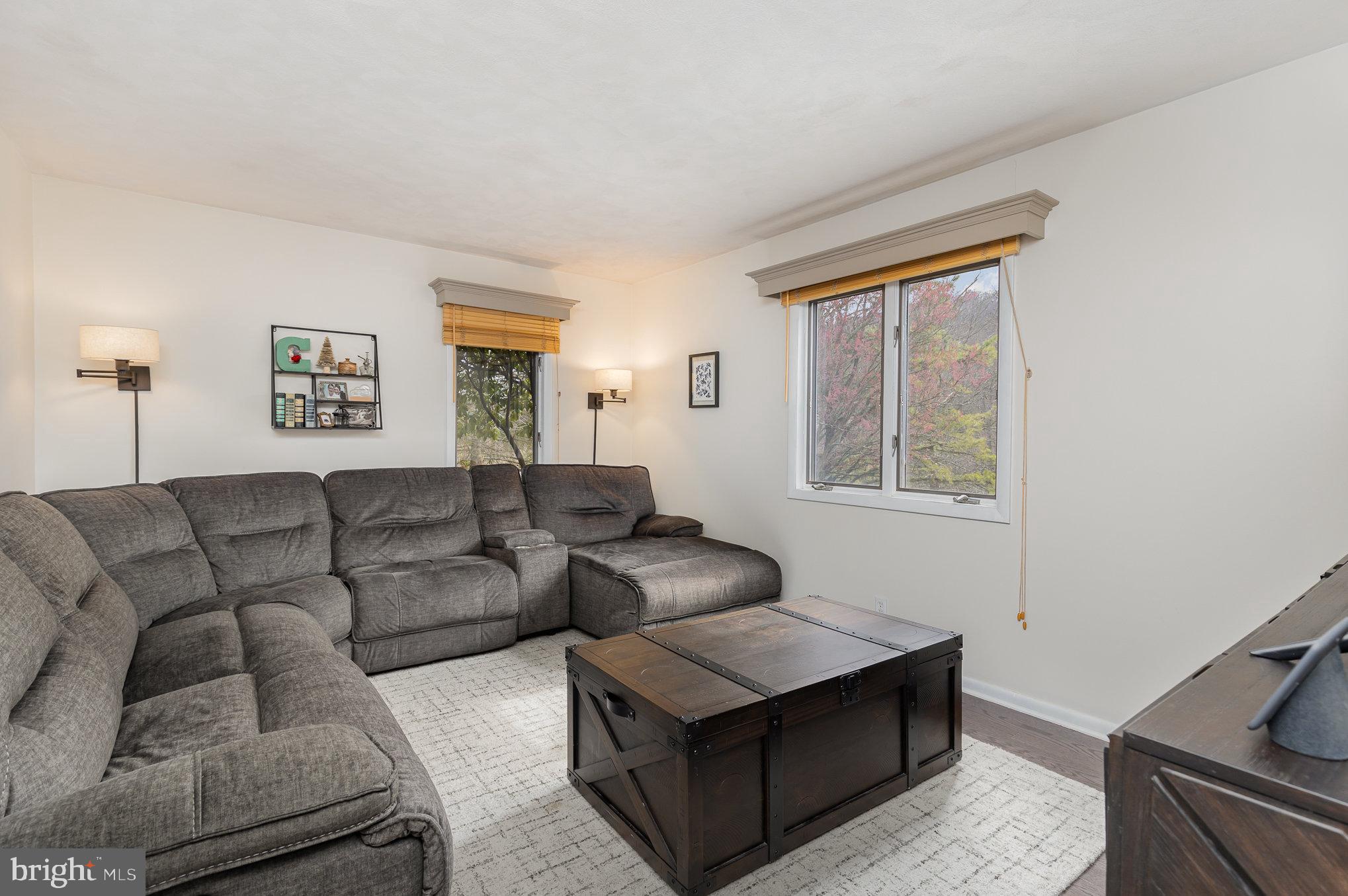 535 Sandy Hollow Road New Bloomfield, PA 17068 - Photo 15 of 51 Comfortable living room with new flooring.