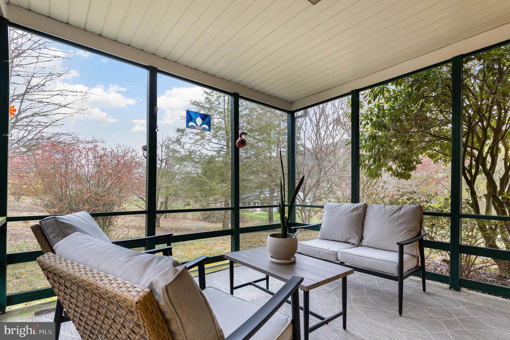 535 Sandy Hollow Road New Bloomfield, PA 17068 - Photo 33 of 51 Just imagine relaxing in the screened porch!